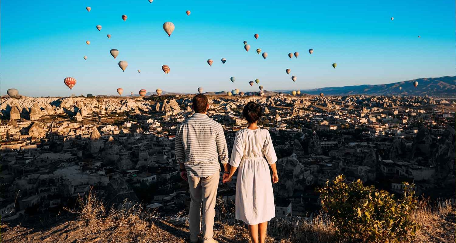 couple-standing-by-each-other-in-turkey-cappadocia-NZ5MG8F.jpg